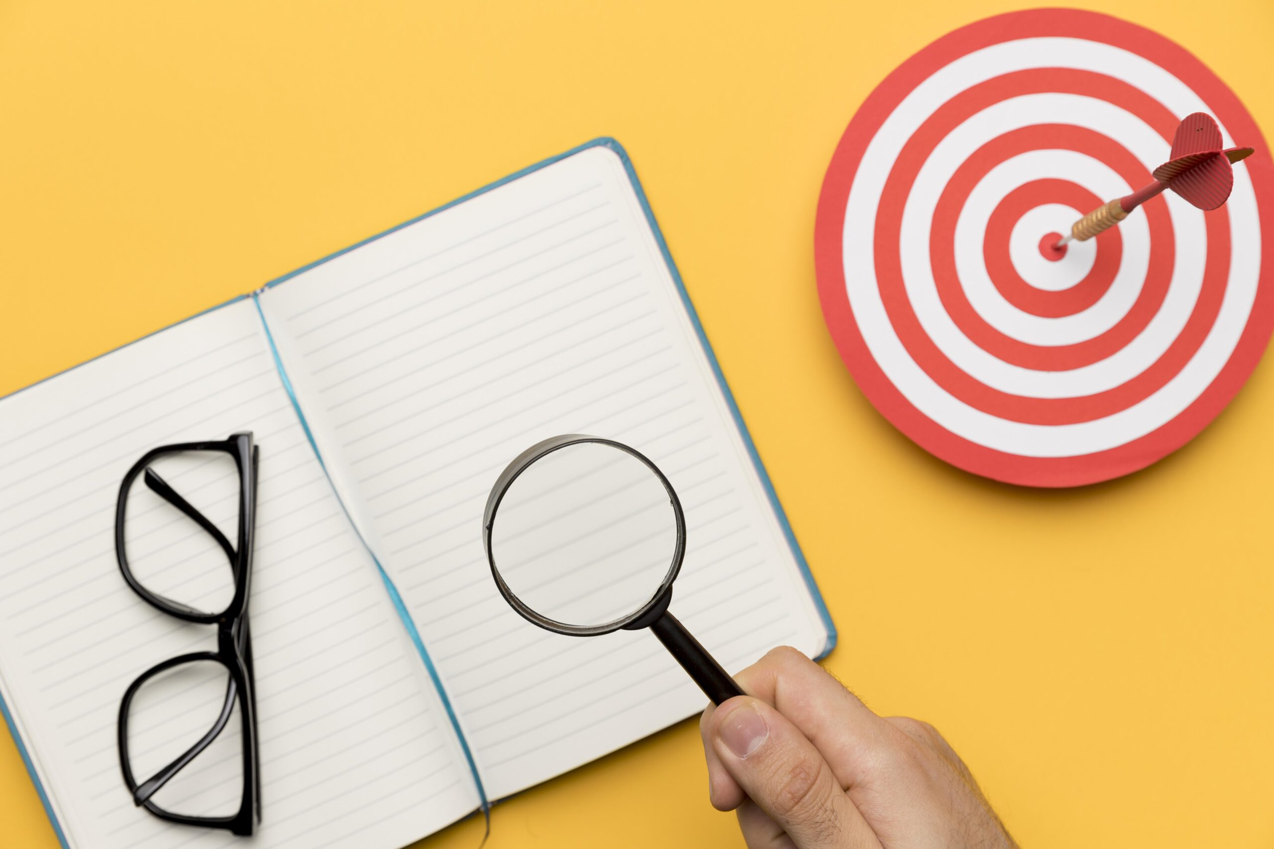 agenda with dartboard magnifier